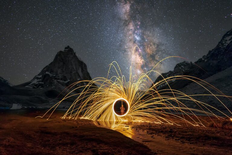 Spectacular long exposure of the Milky Way in Leh with light painting, creating a mesmerizing landscape.